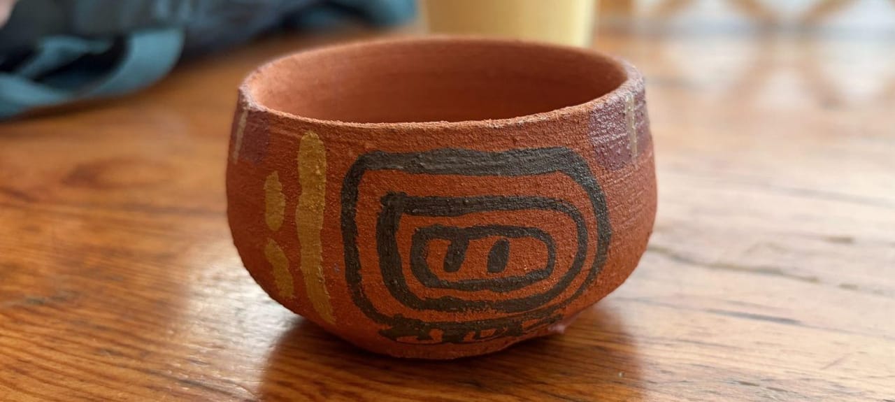 A pottery painting class in progress at Atitlán Pottery in San Pedro La Laguna
