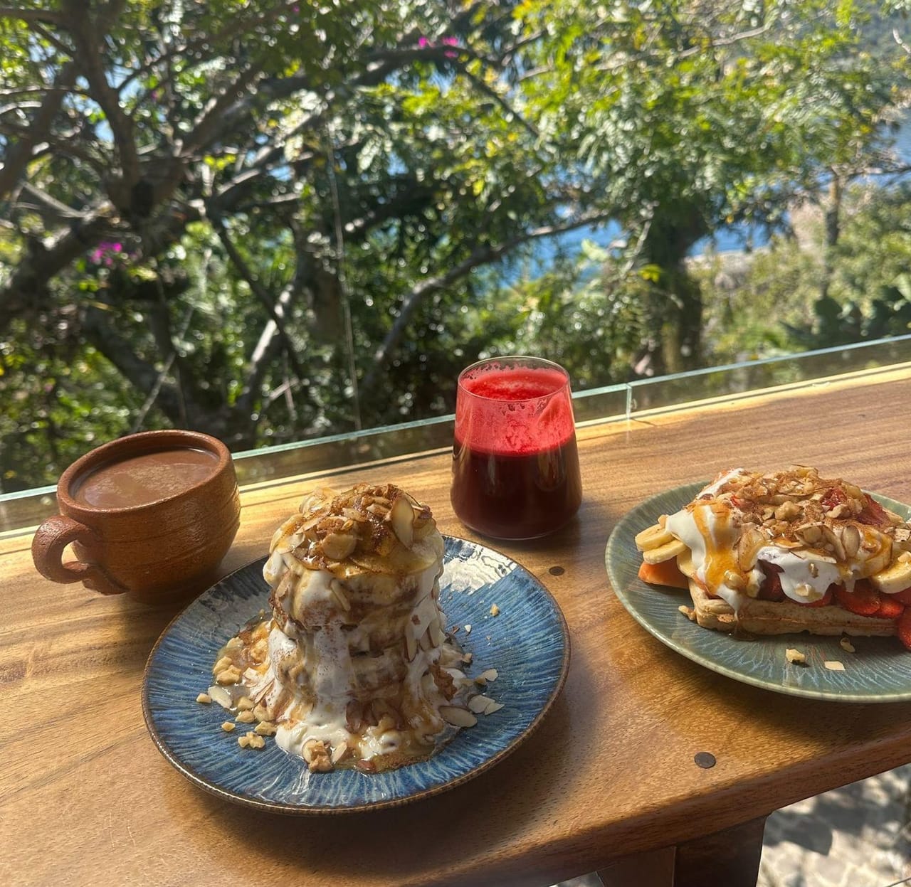 Breakfast with a lake view on the terrace at Molitox Cafe in San Marcos La Laguna