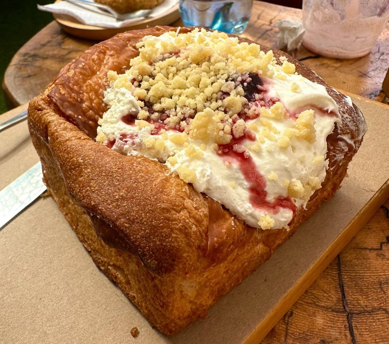 A cream-filled croissant on a plate at Sababa in San Pedro La Laguna